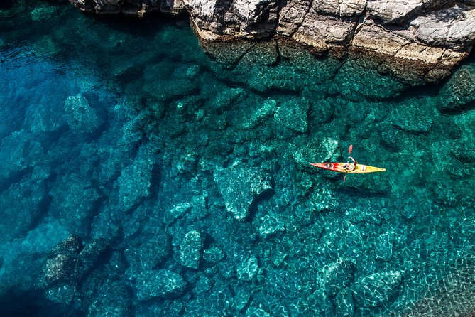 Dubrovnik: Sunset Kayaking & Snorkeling with water &wine - Dubrovnik’s city walls from Pile Bay