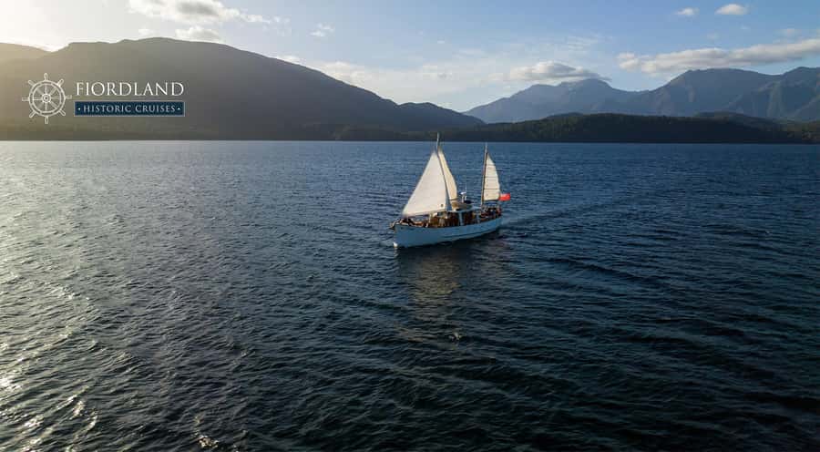 Evening Champagne Cruise on Historic 1935 Motor Yacht. - Boarding Faith at Te Anau’s historic wharf