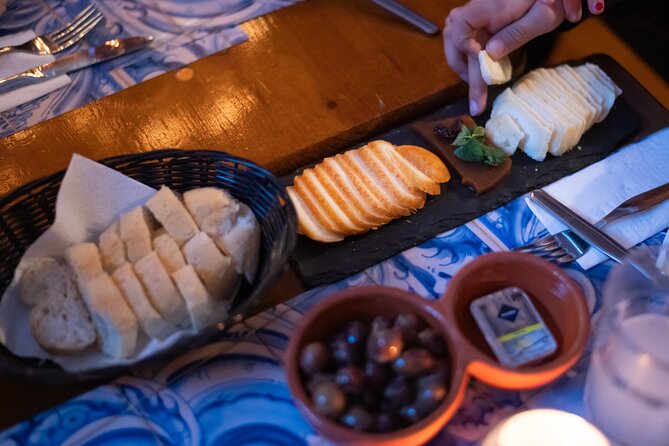 Fado Musical Experience with Portuguese Wine & Appetizers - Portuguese appetizers and a glass of Port