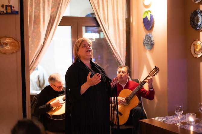 Fado Musical Experience with Portuguese Wine & Appetizers - Entering a small restaurant for live Fado