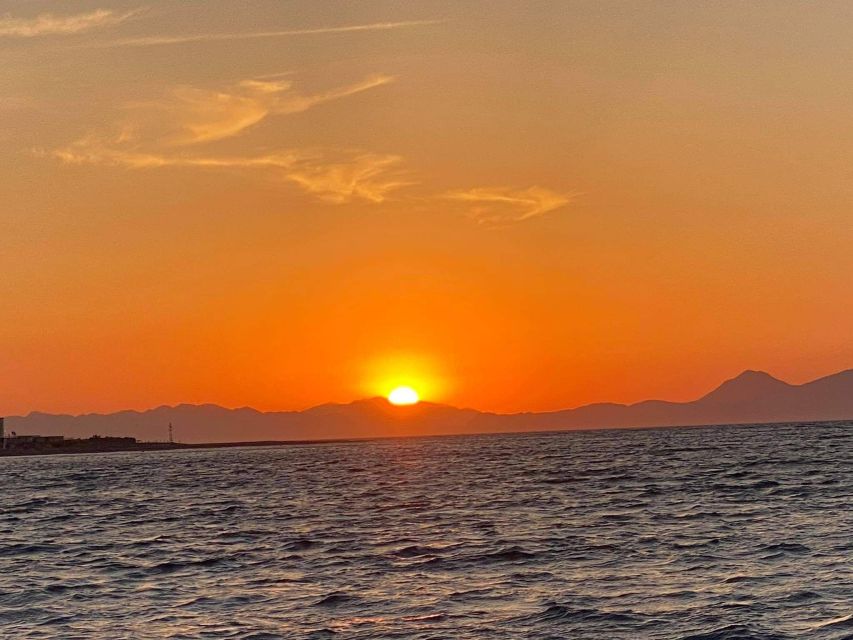 Faliraki: Evening RIB Cruise with Champagne and Sunset Views - Leaving Faliraki as the light softens