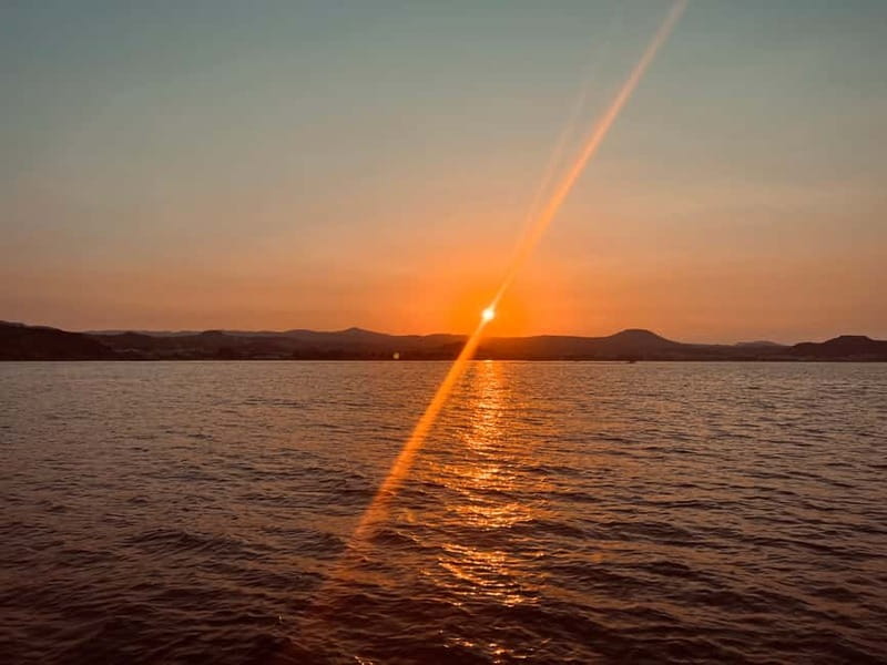 Faliraki: Sunset Cruise with Unlimited Aperol, Beers & Wine - A sunset drink with Rhodes as the backdrop