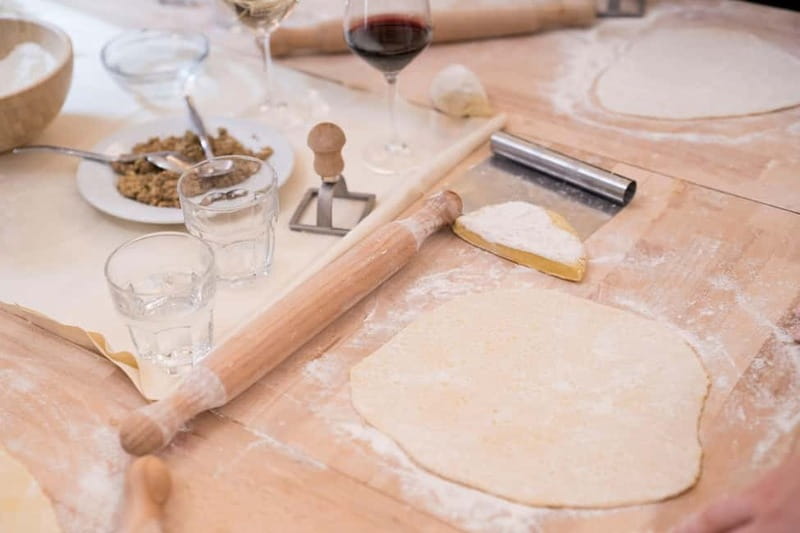 Florence: Premium Pasta Cooking Class with Tiramisu & Wine - Mixing dough from scratch