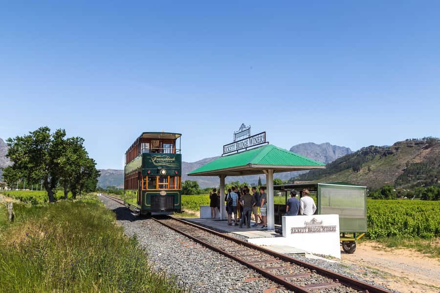 From Cape Town: Franschhoek Wine Tram Hop-on Hop-off - Riding through Franschhoek Valley