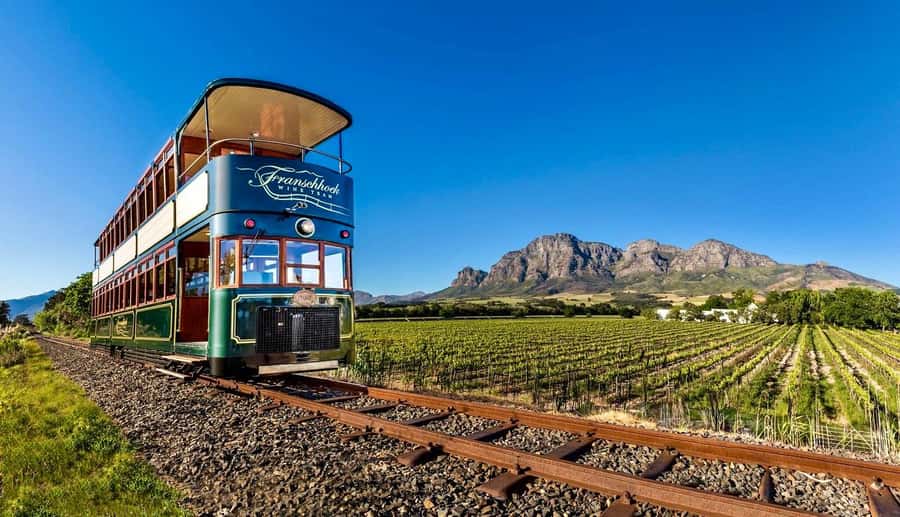 From Cape Town: Winelands Full Day Tour and Wine Tasting - Franschhoek and the open-side tram