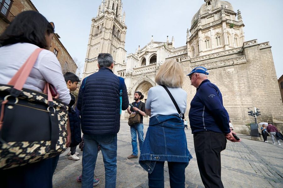 From Madrid: Toledo Tour with Wine Tasting and 3 Monuments - Walking through Toledo with a bilingual guide