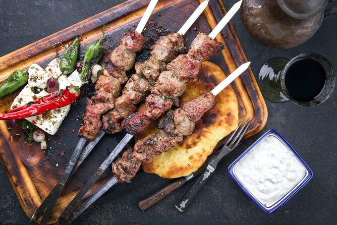 Greek Cuisine Cooking Class in Santorini with Recipes and Wine - Eating the meal with Santorini wine