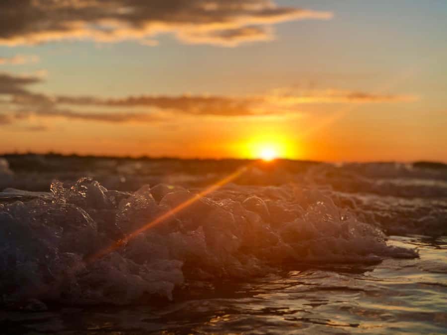 Hervey Bay: Relaxing Sunset Cruise with Champagne and Prawns - Stepping ashore at Weenandin