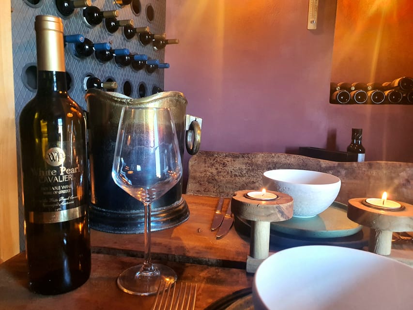 Imerovigli: Premium Wine Tasting with Caldera and Sea Views - Seven glasses at the poolside bistro