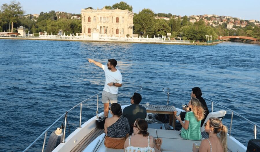 Istanbul: Small Group Yacht Tour with Unlimited Wine - Crossing beneath the Bosphorus Bridge