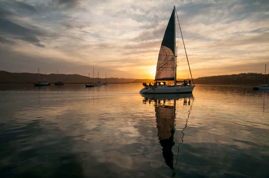 Knysna Sunset Sailing Cruise with Light Dinner and Wine - Through the Knysna Heads, conditions allowing