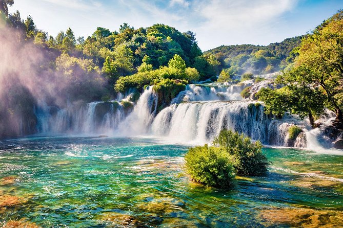 Krka National Park Tour with tour Guide & Wine tasting from Split & Trogir - Walking through Skradinski Buk