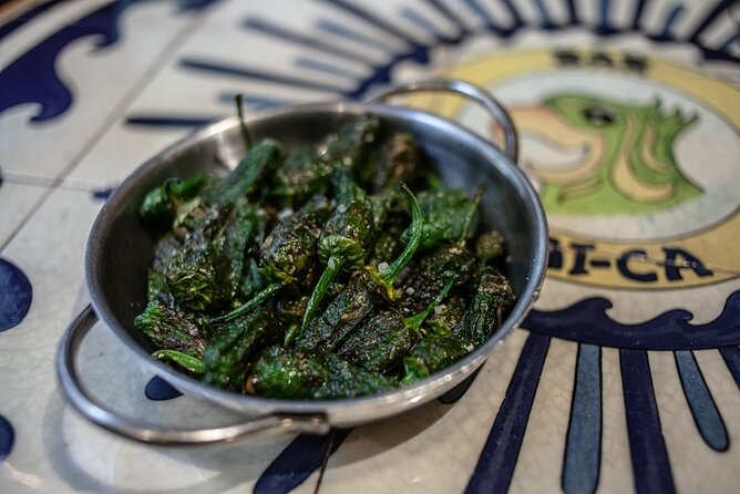 La Barceloneta Tapas & Wine & Drinks Tour in Barcelona - L’Òstia finishes with seafood and the Barceloneta bomb