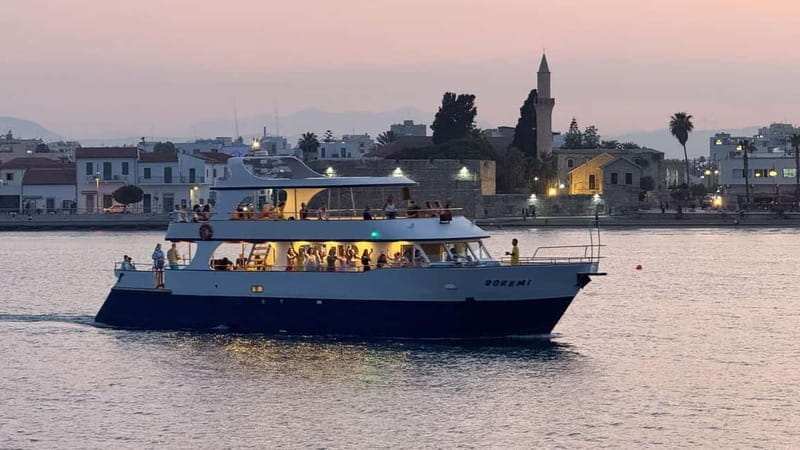 Larnaca: Sunset Cruise with a Glass of Wine - Mackenzie Beach and the 30-minute swim stop
