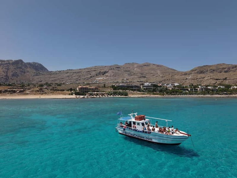Lindos: Sunset Cruise with Unlimited Aperol, Beers & Wine - Leaving Vlycha Beach and heading toward Lindos