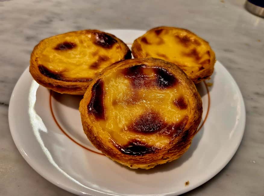 Lisbon Small-Group Food & Wine Tour Eat & Drink like a Local - Finishing with Pastel de Nata and Port
