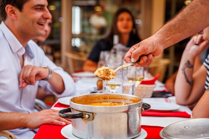 Lisbon Small-Group Portuguese Food and Wine Tour - Rossio Square begins with cod and green wine