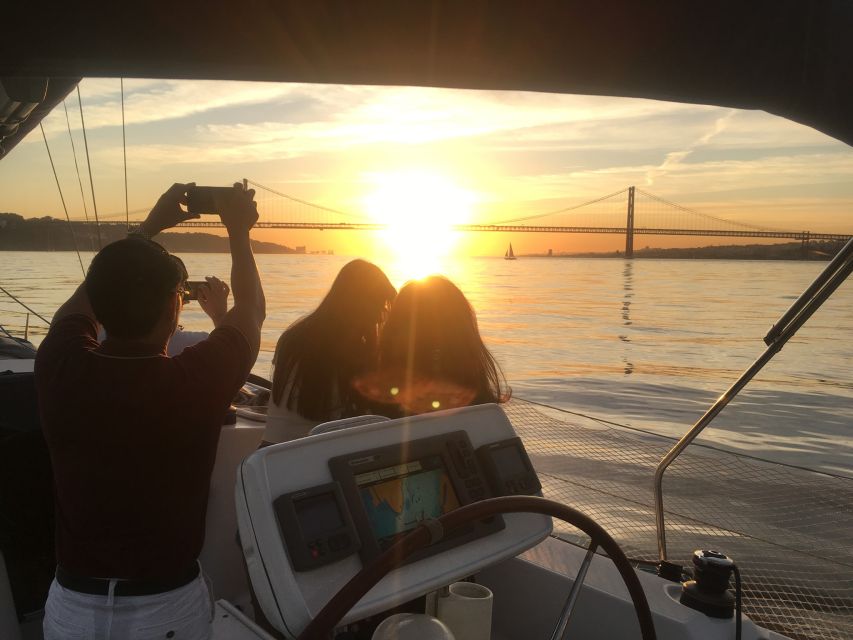 Lisbon: Sunset Sailing Boat Cruise with Wine - Under the 25 de Abril Bridge