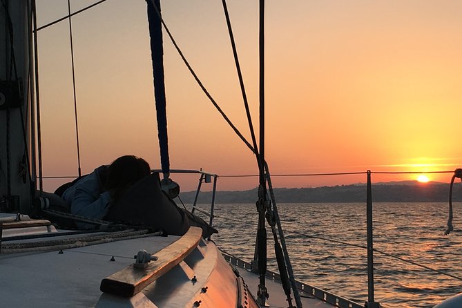 Lisbon Sunset Sailing Tour with White or Rosé Wine and Snacks - Dress for the river, not the pavement