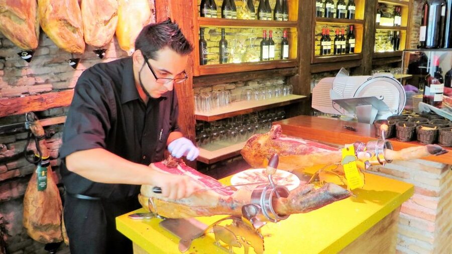 Madrid: Iberico Ham and Spanish Wine Small-Group Food Tour - The first stop: Spanish wine, tapas and food context