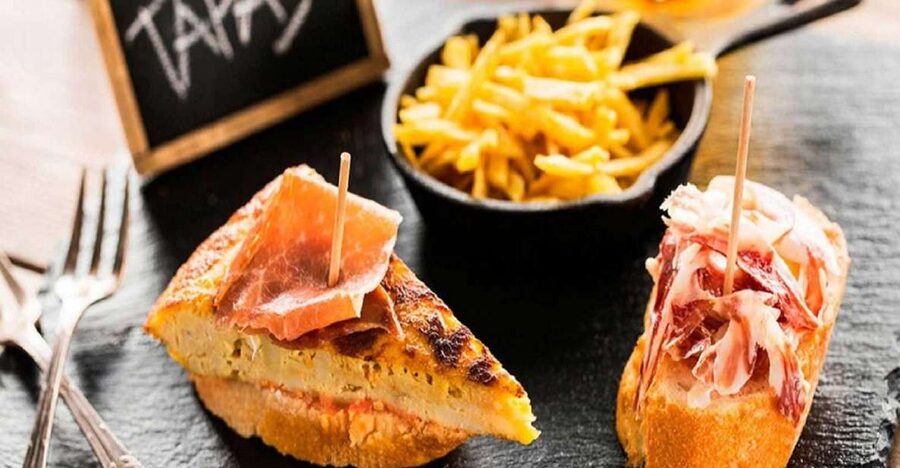 Madrid: Old Madrid Walking Food and Wine Tour - What the three or four tapas stops are like