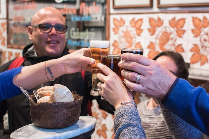 Madrid Tapas & Wine Tasting Walking Tour – Small Group Local Bars - Plaza del Ángel: wine behind the bottles