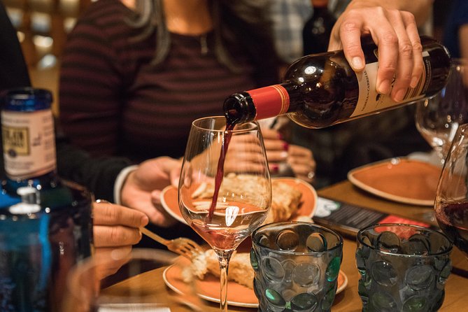 Madrid Tapas & Wine Tasting Walking Tour – Small Group Local Bars - Calle de la Cruz: an open kitchen and changing plates