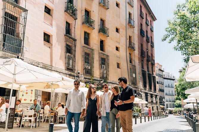 Madrid Tapas & Wine Tour with Rooftop Views and Local Guide - Santa Ana, the Spanish Theater, and garlic shrimp