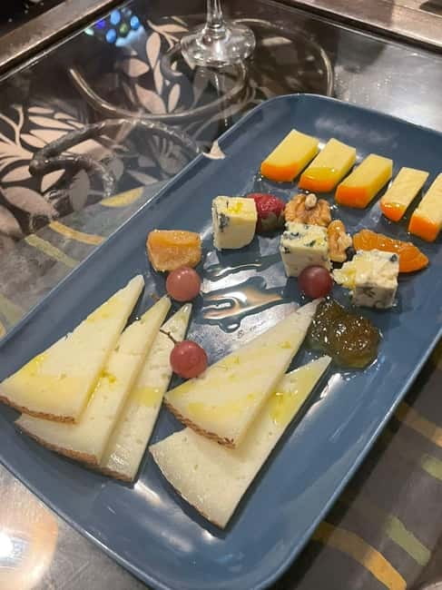 Madrid: Tapas & Wine Tour with Visit to a Rooftop - Plaza Mayor: a central Madrid tasting stop