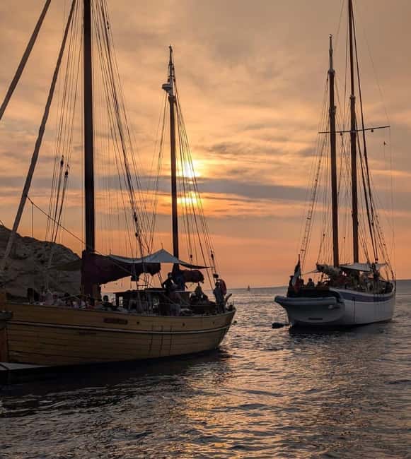 Marseille: Evening sailboat trip to the Calanques du Frioul with buffet and organic wine - Sunset, photographs, and the return to Marseille