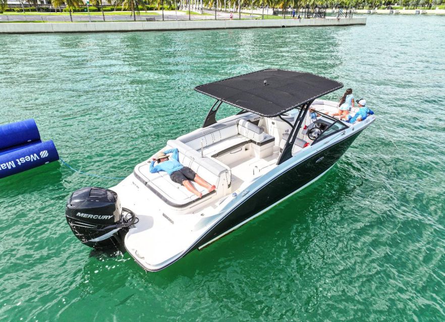 Miami: Guided Boat Tour with Champagne - What the boat includes, and what you still pay