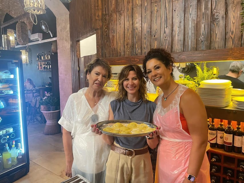 Milan: Pasta and Tiramisu Cooking Class with Wine - Sitting Down to Eat the Pasta You Made