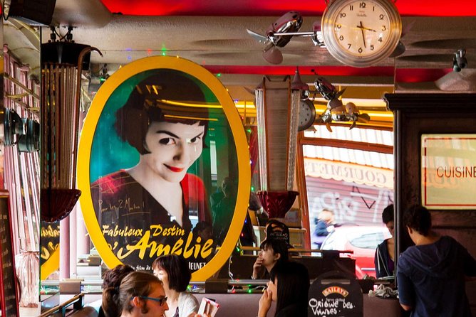 Montmartre Hill French Gourmet Food and Wine Tasting Walking Tour - Starting beneath the Moulin Rouge
