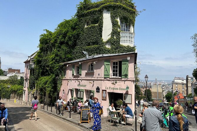 Montmartre Hill French Gourmet Food and Wine Tasting Walking Tour - Climbing toward the windmill and basilica