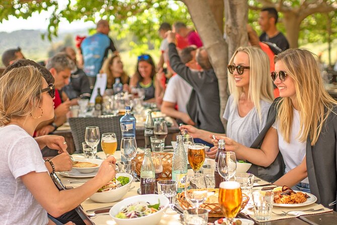 Montserrat Lunch & Wine at Farmhouse Small Group from Barcelona - Free time at the market and monastery grounds