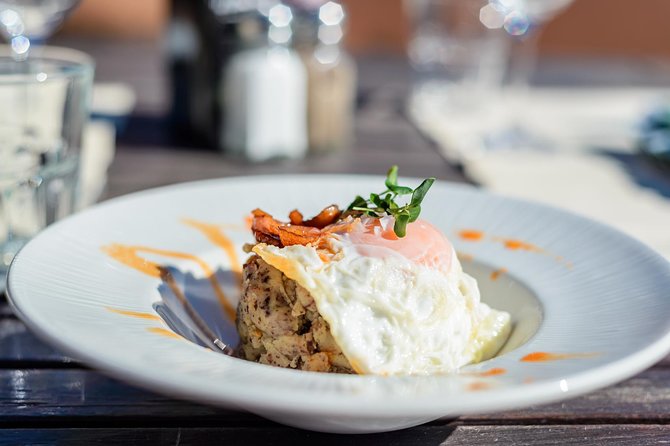 Montserrat Lunch & Wine at Farmhouse Small Group from Barcelona - Timing, weather, and cancellation details