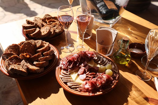 Montserrat Private Day Trip with Codorniu Cava Cellar Tasting - Local food, cheese, and the extra cost of lunch