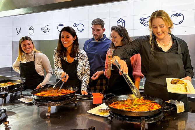 Paella Cooking Class, Wine Tasting & Central Market in Valencia - Tapas, wine, and the long-table meal