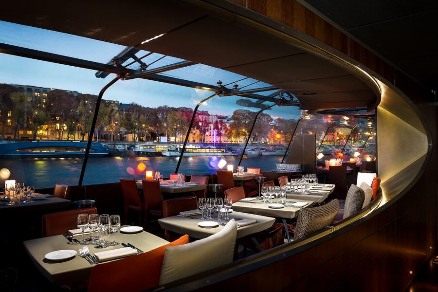 Paris: 3-Course-Dinner Cruise with Wine on the Seine River - The atmosphere: romantic, social, and fairly relaxed