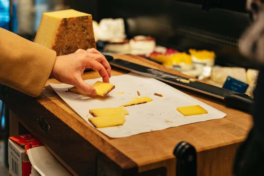 Paris: Gourmet Food Tour with Over 10 Tastings and Wine - Cheese at La Fromagerie du Louvre