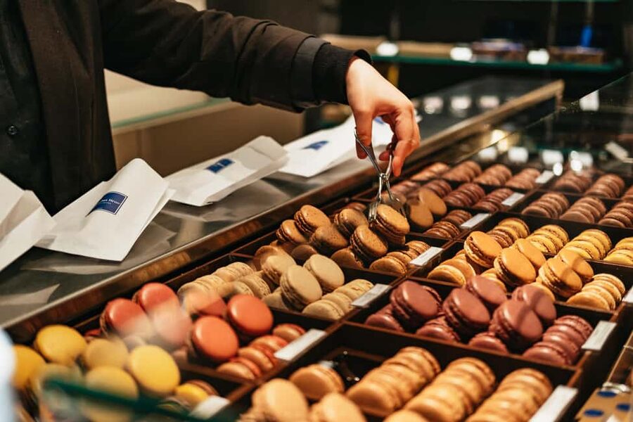 Paris: Gourmet Food Tour with Over 10 Tastings and Wine - A sit-down wine bar with cheese and charcuterie