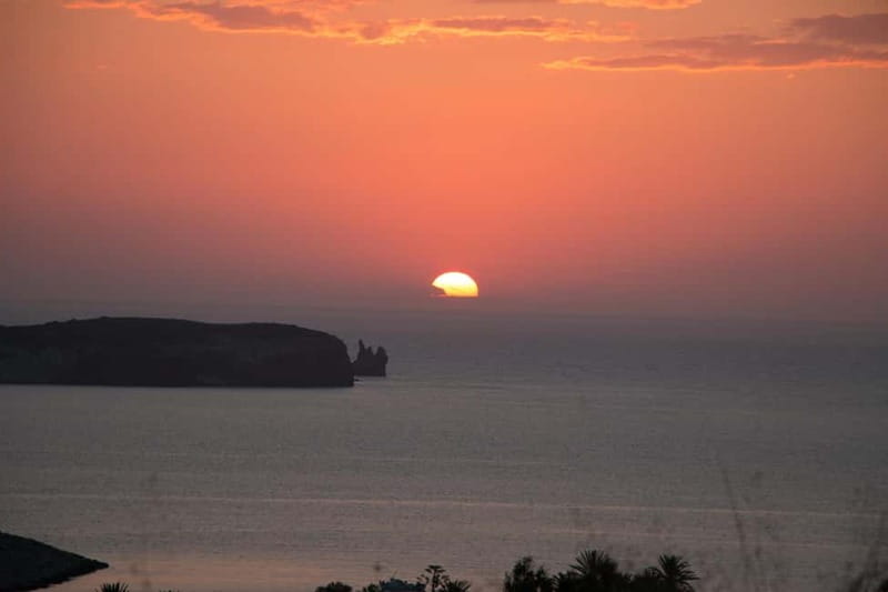 Paros: Sunset Boat Trip with Soft Drinks and Local Wine - Fira channel, wine, and the good part of doing less
