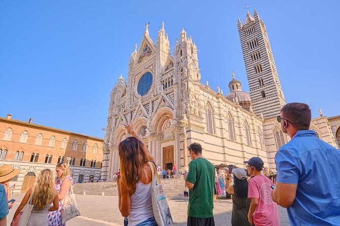 Pisa, Siena and San Gimignano Day Trip with Lunch & Wine Pairing - The coach, guides, and group size