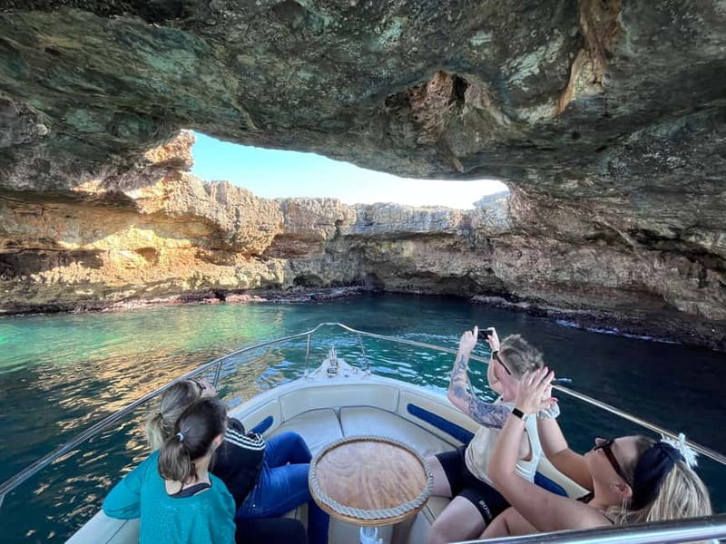 Polignano: Coastline Tour With Prosecco And Taralli & Swim - Entering Polignano’s famous sea caves