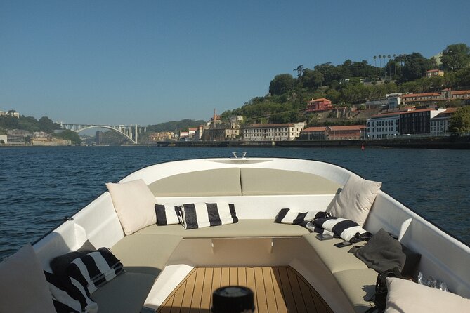 Porto: Douro River Boat Cruise with Port Wine and Snacks - Why the small boat changes the experience