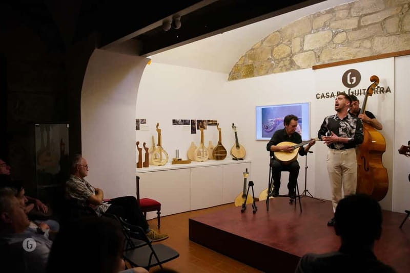 Porto: Fado & Port Wine in Traditional Portuguese Music Shop - The instruments are part of the story