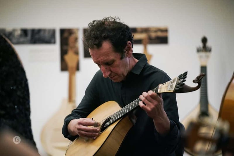 Porto: Fado & Port Wine in Traditional Portuguese Music Shop - Arriving at Casa da Guitarra near the bridge