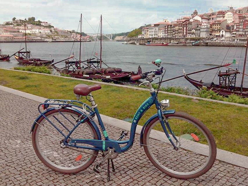 Porto: Self-Guided Bike and Boat Tour with Port Wine Tasting - Collecting your bike and crossing into Gaia