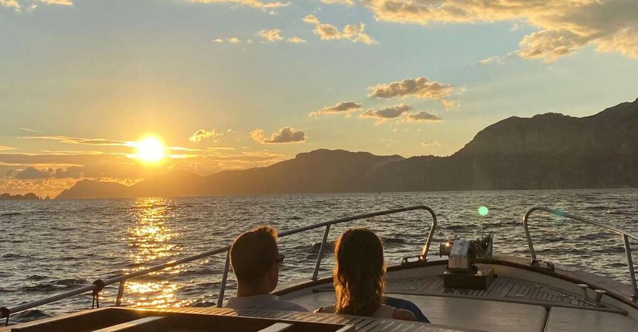 Positano: Sunset Group Boat Tour Amalfi Coast with Prosecco - Along the coast toward Praiano