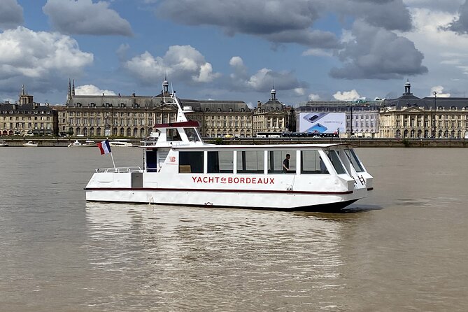 Prestige Commented Cruise glass of wine and Canelé in Bordeaux - Bordeaux’s historic center from the Garonne